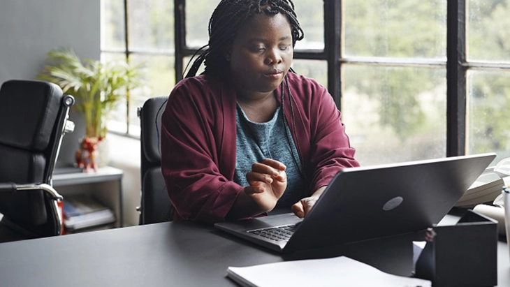 Woman working with lap top